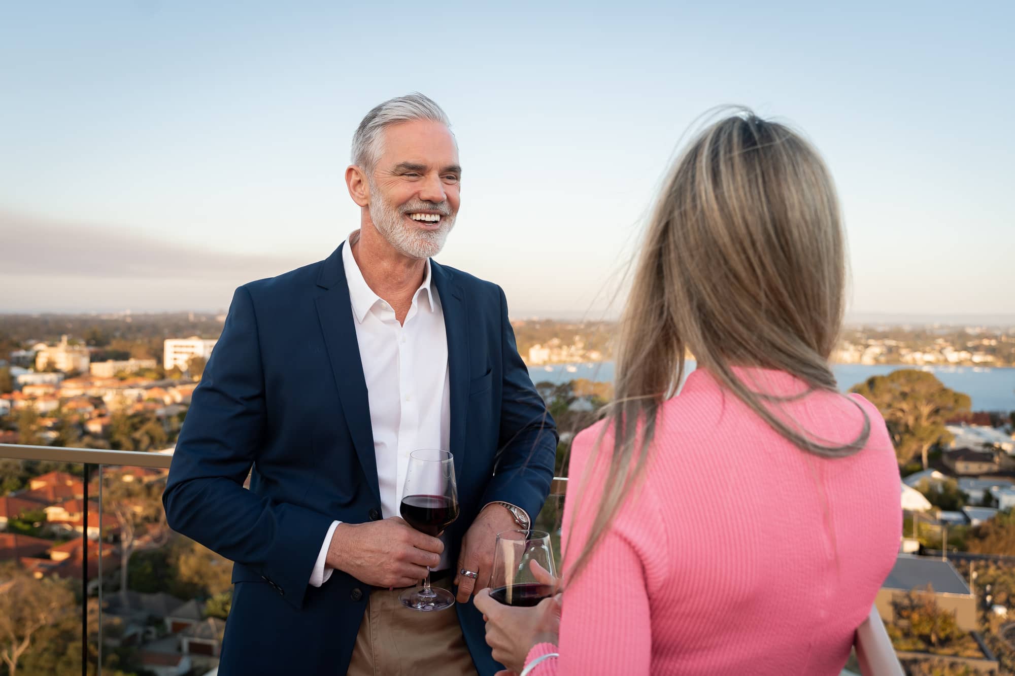 man smiling at woman