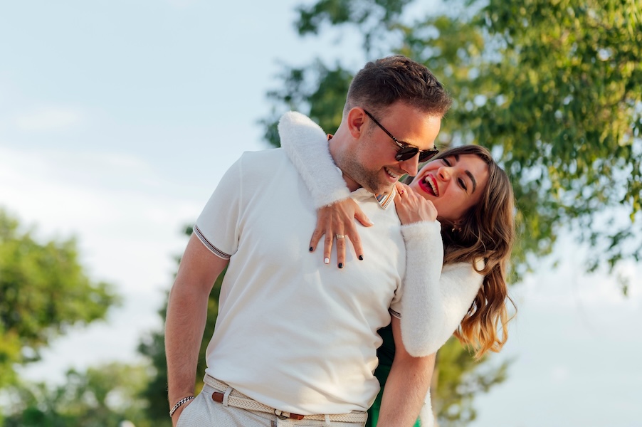 Young couple in love hugging in the park